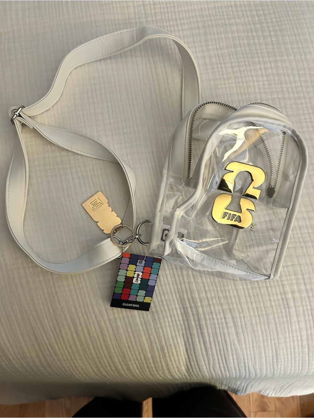 FIFA Clear White Crossbody Bag with Gold Accent